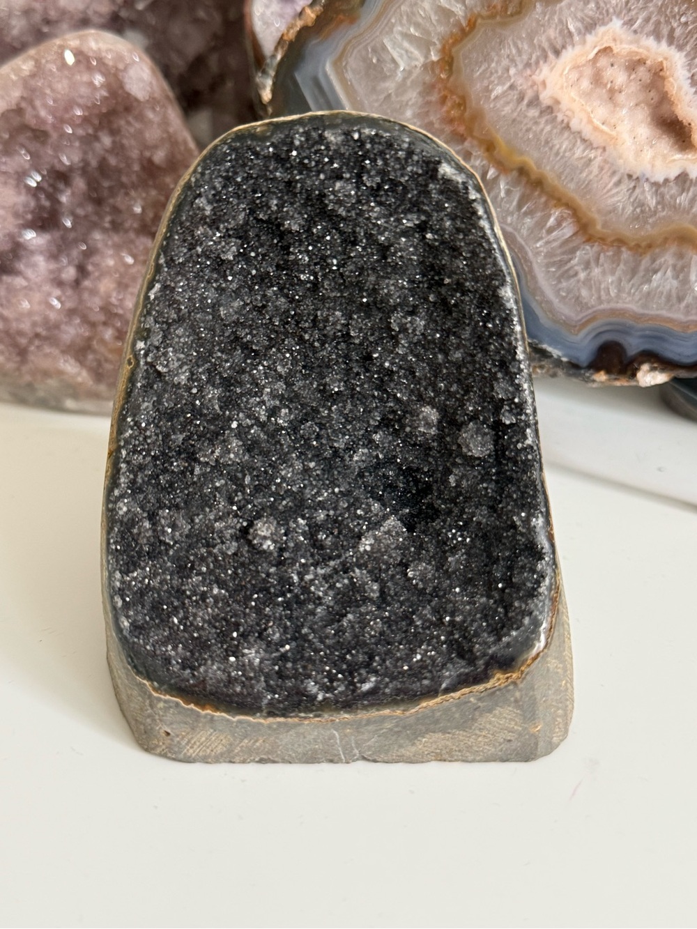 Natural sparkly black amethyst cut base specimen from Brazil